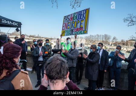 VTC and bicycle delivery drivers gathered next to the National Assembly to protest against future European regulations favorable to Uber and similar companies in Paris, France on February 24, 2021. Photo by Pierrick Villette/Avenir Pictures/ABACAPRESS.COM Stock Photo