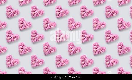 Seamless pattern of pink hydrangea flowers on grey background. Floral pattern. Stock Photo