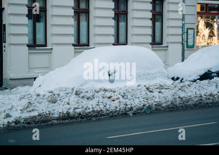 car completely covered in snow Stock Photo