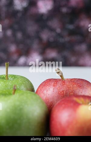 Green and red apples on dark background Stock Photo