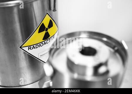 Radioactive waste of nuclear power plant of fuel uranium in barrel is sent for reprocessing and burial. Stock Photo