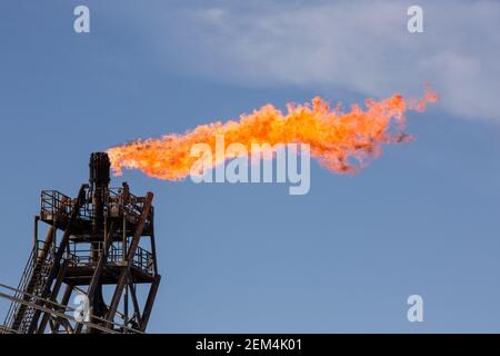 A flare on an offshore oil installation or rig Stock Photo