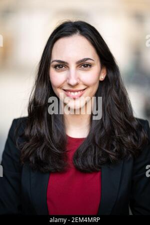 Hamburg, Germany. 24th Feb, 2021. Sina Demirhan (Bündnis 90/Die Grünen), member of the Hamburg Parliament and spokesperson for extracurricular education and strategies against the right for the Green parliamentary group, stands at Hamburg City Hall. Credit: Daniel Reinhardt/dpa/Alamy Live News Stock Photo