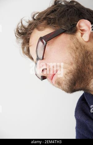 Close-up of a mid adult man wearing eyeglasses Stock Photo