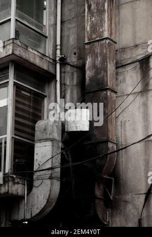 Low angle view of chimney along a building Stock Photo
