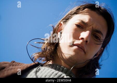 Portrait of a young woman wearing headphones Stock Photo