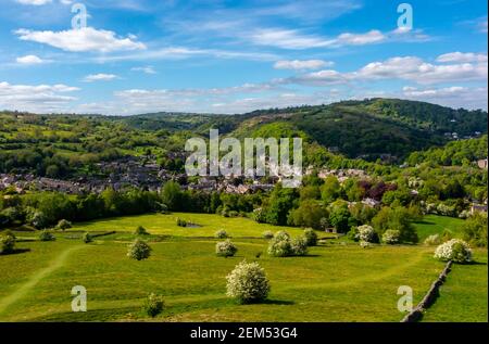 Landscape with trees and hills in early summer at Cromford in the Peak District Derbyshire Dales England UK Stock Photo