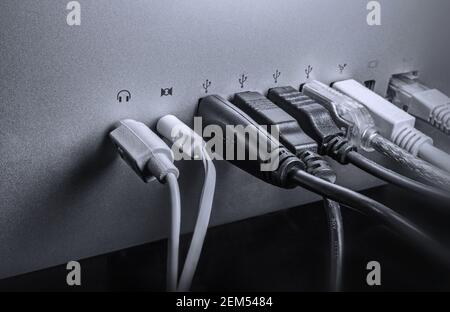 Various ports and connections on the back of the computer. Stock Photo