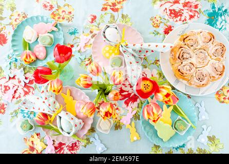 Colorful table setting with sweets for Easter Stock Photo