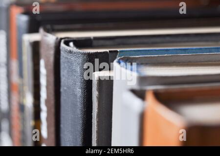 Various old books on a shelf. Closeup with shallow dof. Stock Photo