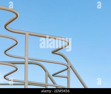 twisting and turning metal hand rails Stock Photo