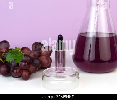 Organic bio grape cosmetics. Extract, grape seed oils, serum. Abstract cosmetic laboratory. Stock Photo