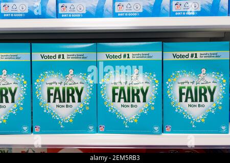large box of Fairy non-bio washing powders line up dsiplay on shelf for sale in store, Kent