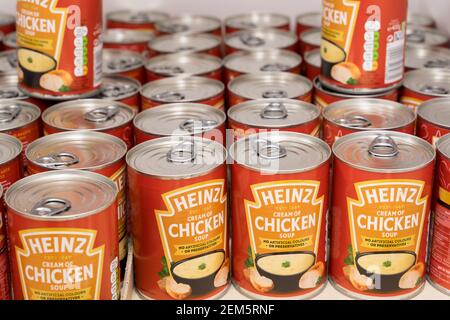 Tins of chicken soup by Heinz Stock Photo