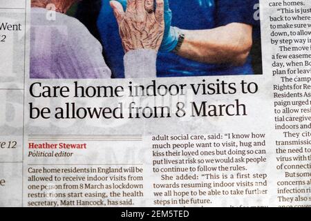 'Care home indoor visits to be allowed from 8 March' Guardian newspaper headline on Covid article inside page 20 February 2021 London England UK Stock Photo