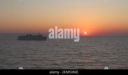 Ship On Sea Sunset. Stock Photo