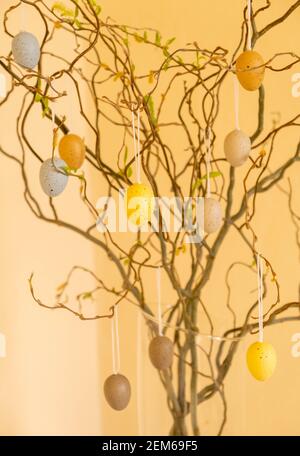 Branches decorated with Easter eggs. Decorations for the Easter holiday Stock Photo