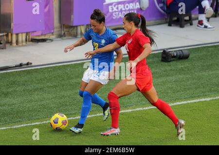 Orlando, Florida, USA. February 24, 2021: Brazil defender CAMILA (18) competes for the ball against Canada midfielder JORDYN LISTRO (21) during the SheBelieves Cup Canada vs Brazil match at Exploria Stadium in Orlando, Fl on February 24, 2021. Credit: Cory Knowlton/ZUMA Wire/Alamy Live News Stock Photo