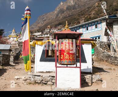 Thamo gompa with prayer flags and buddhist symbols - monastery in Khumbu valley on three passes trek, Mount Everest area, Sagarmatha national park, Ne Stock Photo
