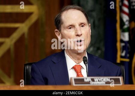 Washington, United States. 24th Feb, 2021. Senate Finance Committee Chairman Ron Wyden (D-Ore.) makes an opening statement during a nomination hearing for Xavier Becerra to be Secretary of Health and Human Services on Capitol Hill in Washington, DC on February 24, 2021. If confirmed, Becerra would be the first Latino secretary of HHS. Pool Photo by Greg Nash/UPI Credit: UPI/Alamy Live News Stock Photo