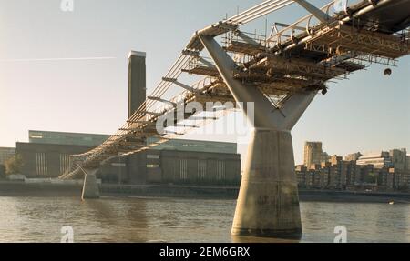 The millenium bridge under repair over the river thames, southwark, London, england Stock Photo