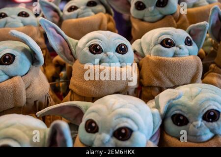 USA - New York, 01.30.2022: Presentation Of Robotic Characters From The  Star Wars Universe. HDR. Baby Yoda Or Grogu Sitting In The Cradle And  Moving His Head, Mandalorian. Stock Photo, Picture and