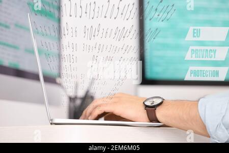 Male programmer working in office Stock Photo