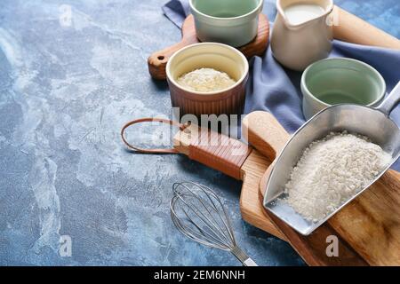 Set of kitchen utensils and ingredients for preparing bakery on color background Stock Photo