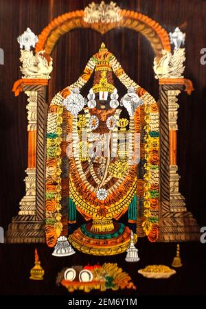 Close-up view of Indian Hindu God Balaji or venkateswawara wooden painting in a temple Stock Photo