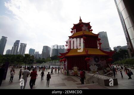 KUALA LUMPUR, MALASIA – JANUARY 26, 2020   Chinese New Year decorations in Kuala Lumpur city centre and decorated pagoda Stock Photo