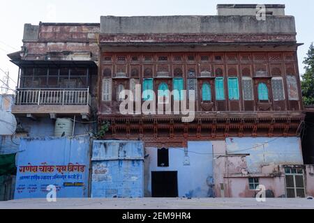 Blue white washed walls and painted doors of old house of jodhpur city, jodhpur, Rajasthan, India. Stock Photo