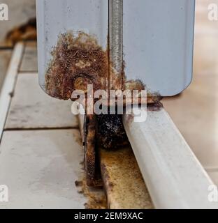 Rust on the shower sliding door. Rusty surface. Remove rust concept Stock Photo