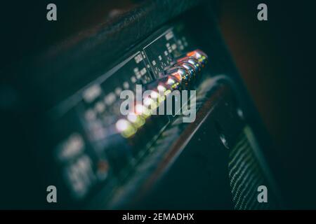 Knobs for volume, tone and various settings on the guitar amp. Guitar combo. Close up. Selective focus Stock Photo