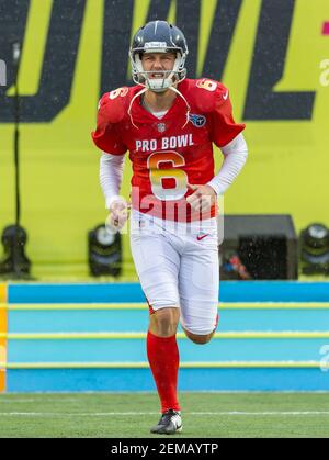 Tennessee Titans punter Brett Kern #6 is thrown for a loss while attempting  a fake punt during an NFL football game between the Tampa Bay Buccaneers  and the Tennessee Titans, Sunday, Oct.