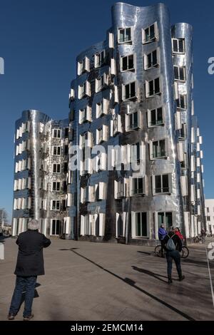 Neuer Zollhof or Der Neue Zollhof (The New Zollhof), building clad in stainless steel by architect Frank O. Gehry, Düsseldorf MedienHafen, Dusseldorf, Stock Photo