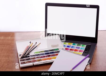 Drawing lesson online on a laptop works on a computer. Online education concept. Stock Photo