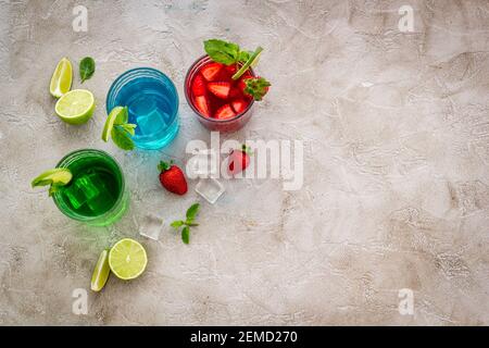 Fresh iced cocktail set with lime mint and strawberry Stock Photo