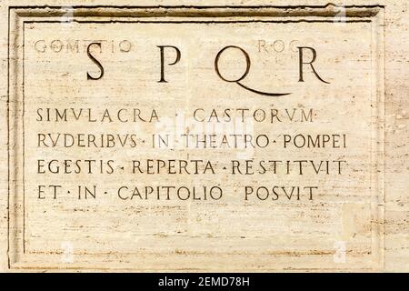 Rome, Italy - Oct 03, 2018: Commemorative inscription on the pedestal of the statue, Capitoline Square, Rome Stock Photo