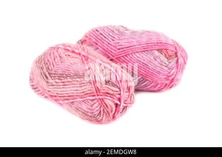 Two knitting yarn clews and knitting needles isolated on white background. Stock Photo