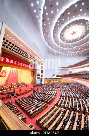 Beijing, China. 25th Feb, 2021. A grand gathering is held to mark the nation's poverty alleviation accomplishments and honor model poverty fighters at the Great Hall of the People in Beijing, capital of China, Feb. 25, 2021. Credit: Li Xiang/Xinhua/Alamy Live News Stock Photo