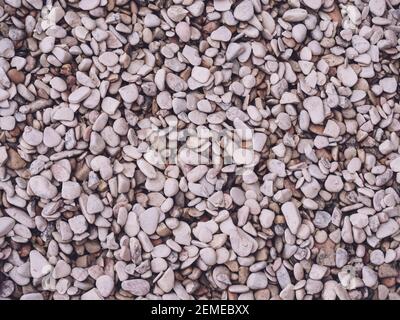 White little pebbles for construction site. pebbles texture background. close up on pile of gravel for construction Stock Photo