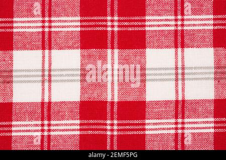 Red and white kitchen towel texture as a background, horizontal picture. Stock Photo