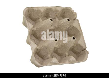 Isolated light gray viol is empty for nine eggs. Stock Photo