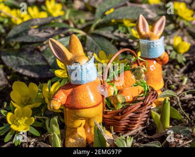 Easter holiday coronavirus symbolic Easter bunnies Stock Photo