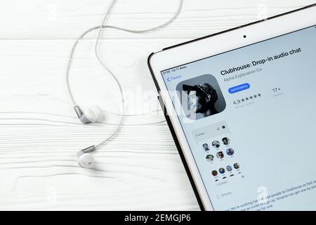 KHARKOV, UKRAINE - FEBRUARY 14, 2021: Clubhouse app in app store market on ipad display screen. Clubhouse is invitation only audio chat iPhone app lau Stock Photo
