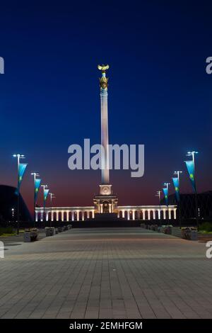 Kazakhstan, Astana, KazakYeli monument (Kazakh Country) at sunrise