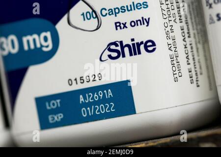 A Shire Logo Is Seen On Prescription Pharmaceutical Packaging Photographed In A Pharmacy Stock Photo Alamy