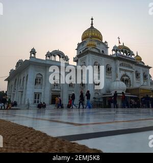 Gurdwara Bangla Sahib is the most prominent Sikh Gurudwara, Bangla Sahib Gurudwara in New Delhi, India inside view during evening time Stock Photo