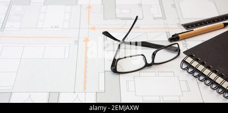 Construction blueprints and architect workplace. Real estate, housing project design, engineer office concept. Stock Photo