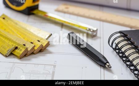 Real estate, housing project design, construction site concept. Project blueprints and architect engineer pencil. Stock Photo